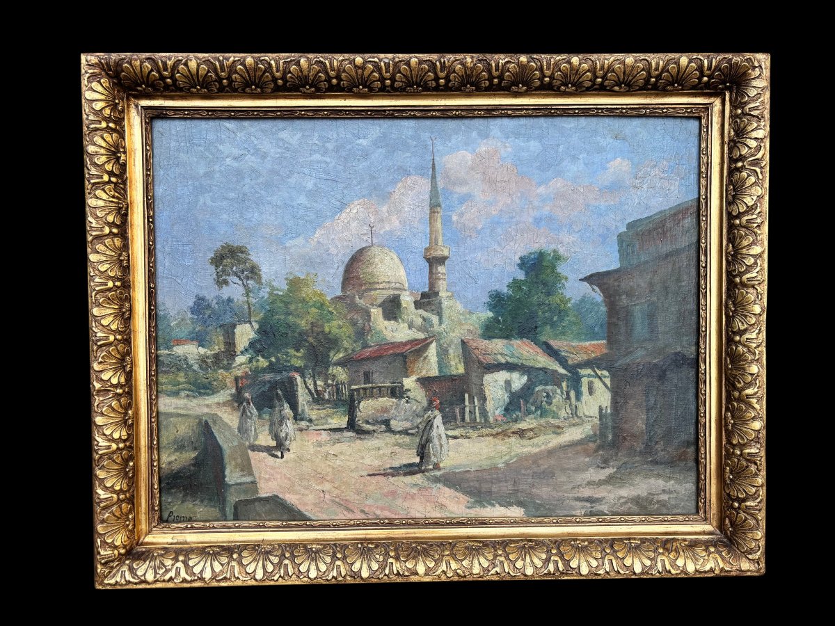 Dipinto raffigurante un paesaggio orientale, firmato in basso a sinistra