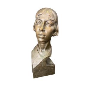 Busto in bronzo raffigurante donna siglato e datato 1930