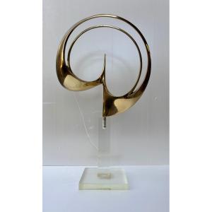Scultura in bronzo dorato su base in plexiglass firmata e datata "Carmelo Cappello '74"