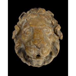 Mascherone da fontana in marmo giallo