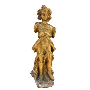 scultura in legno dorato raffigurante un angelo
