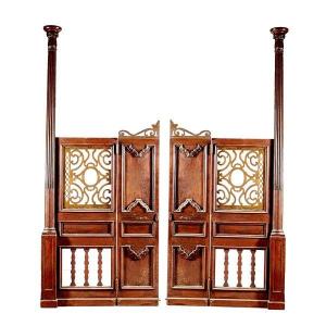 porta con 4 battenti con apertura a doppio senso, colonne laterali e pannelli in metallo trafo