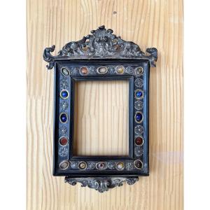 Cornice in legno ebanizzato con inserti in pietre dure