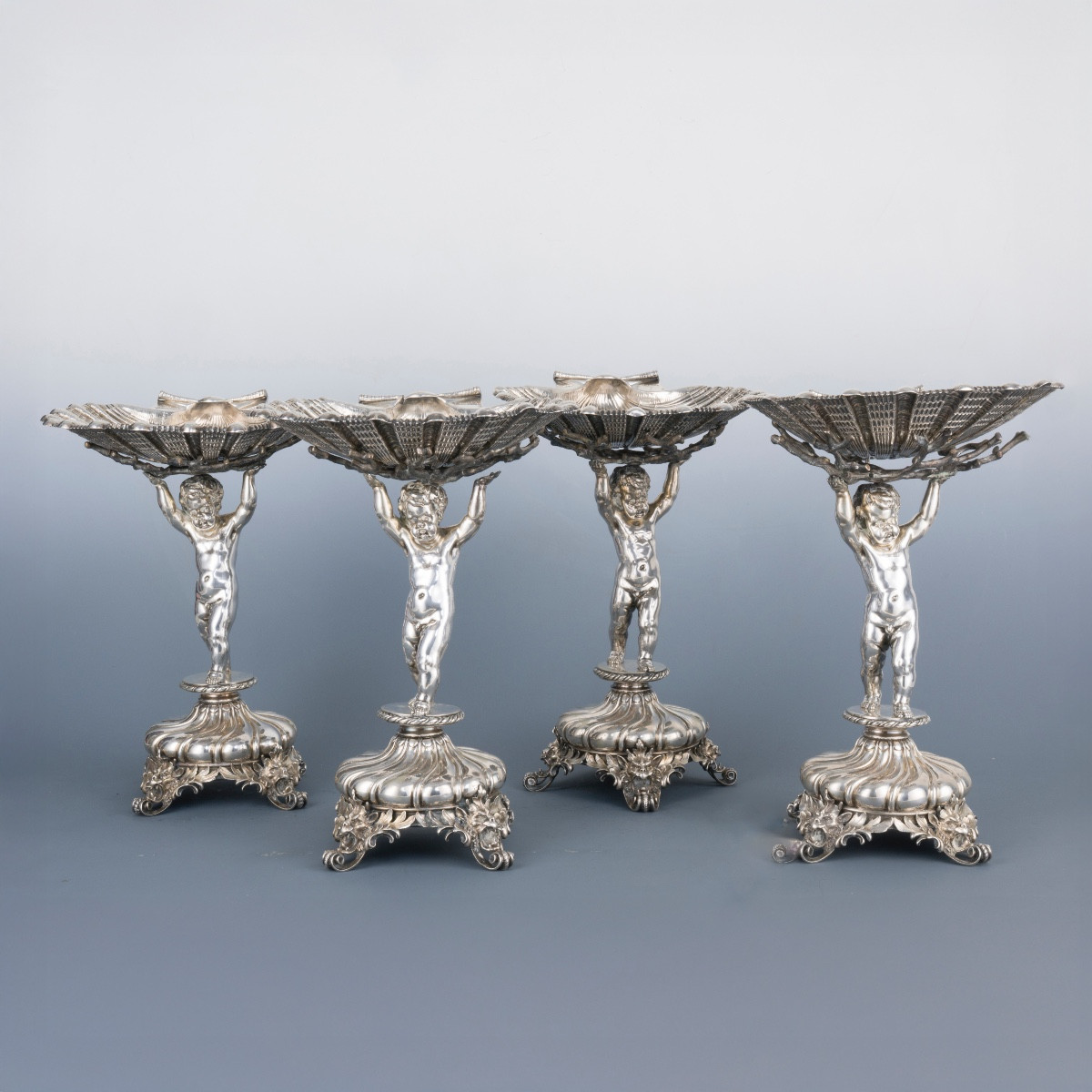 Quattro alzate in argento