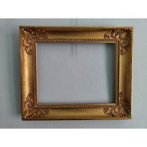 Cornice in legno dorato a foglia XIX sec.