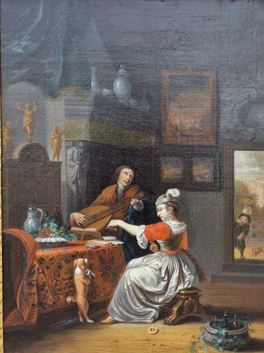Interno elegante con gentiluomo musicista, dama e cane – Scuola olandese del XVII secolo-photo-2
