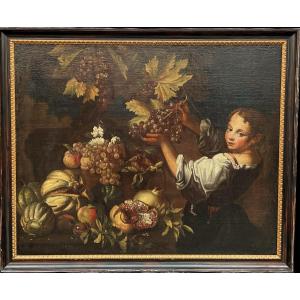 MICHELE PACE DA CAMPIDOGLIO, att. a (Roma 1610 ca. - 1670 ca.) PAESAGGIO CON NATURA MORTA DI FRUTTA E FANCIULLO