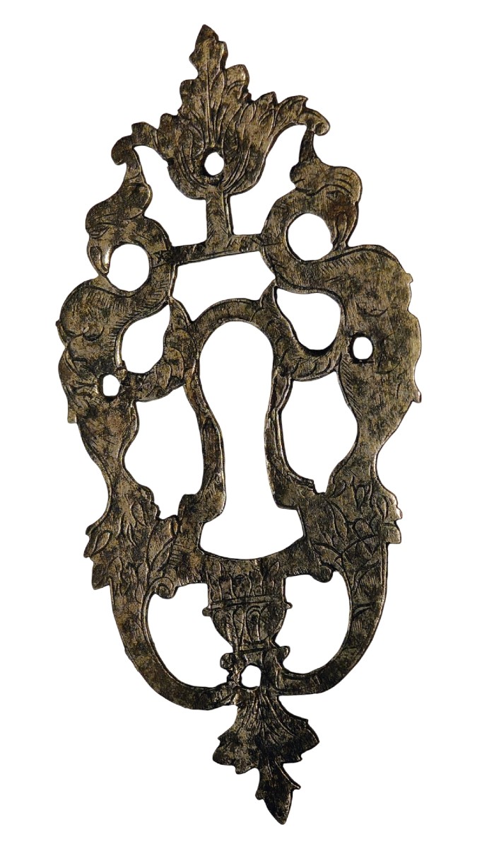 Bocchetta in ferro forgiato traforato ed inciso fine XVII secolo