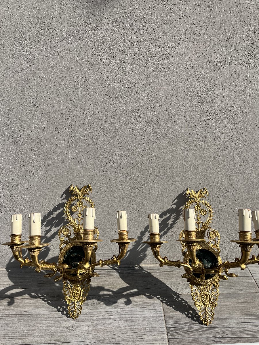 Coppia di applique in bronzo dorato