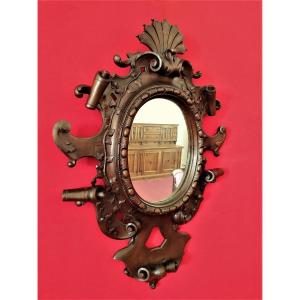 Specchio in legno intagliato