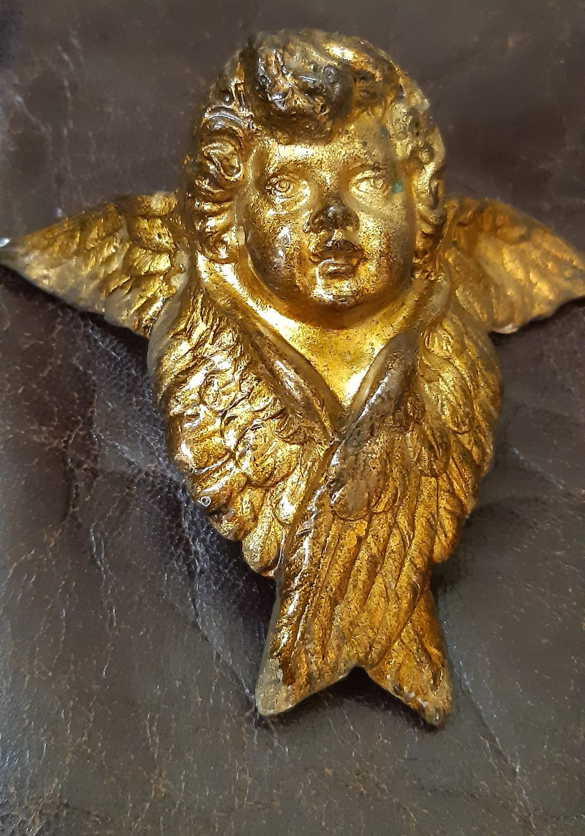 Coppia teste angeli secolo XVIII