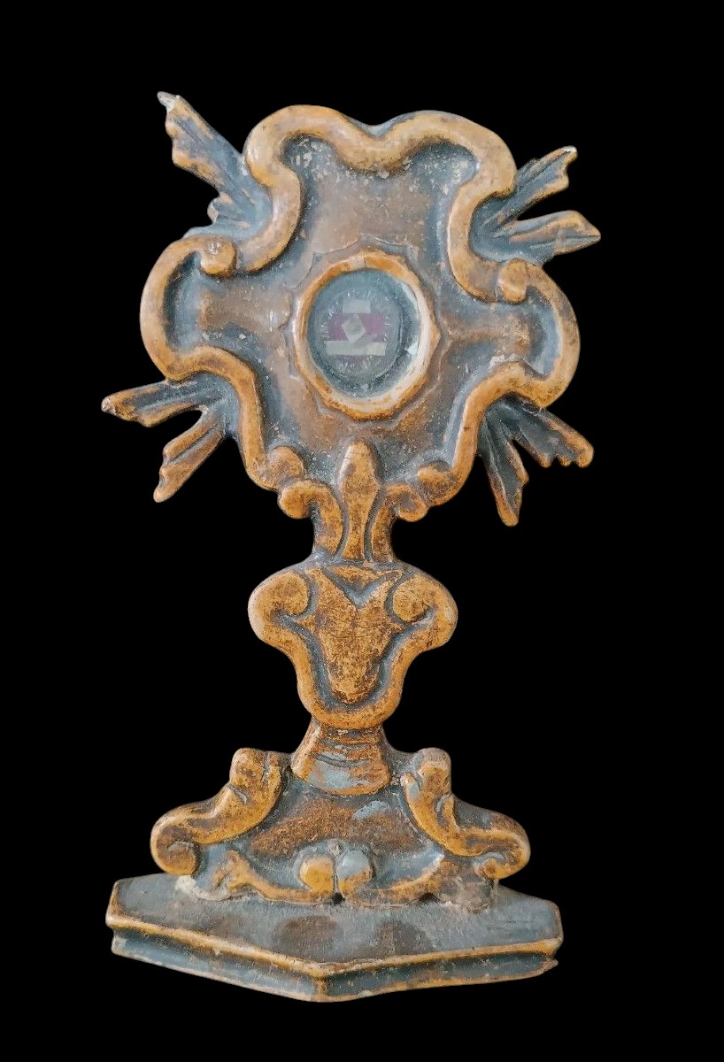 Piccolo reliquiario in legno laccato con reliquia XVIII secolo