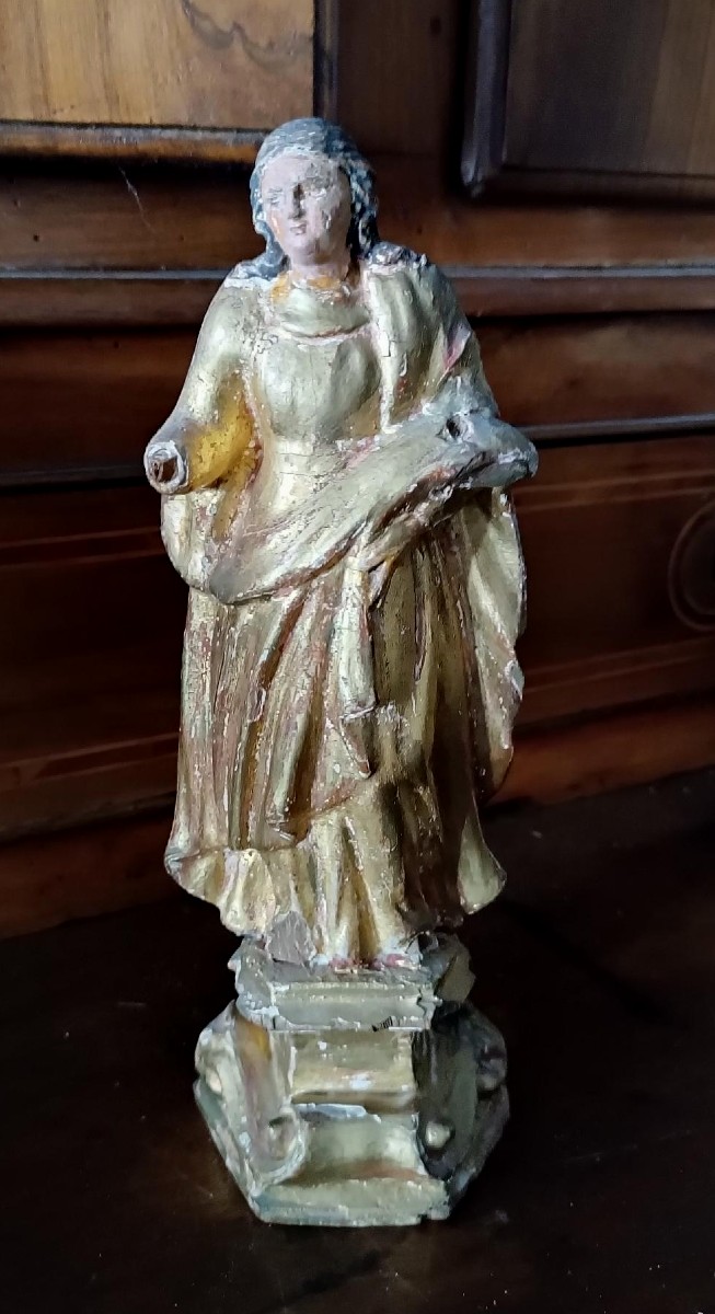 Antica scultura in legno dorato