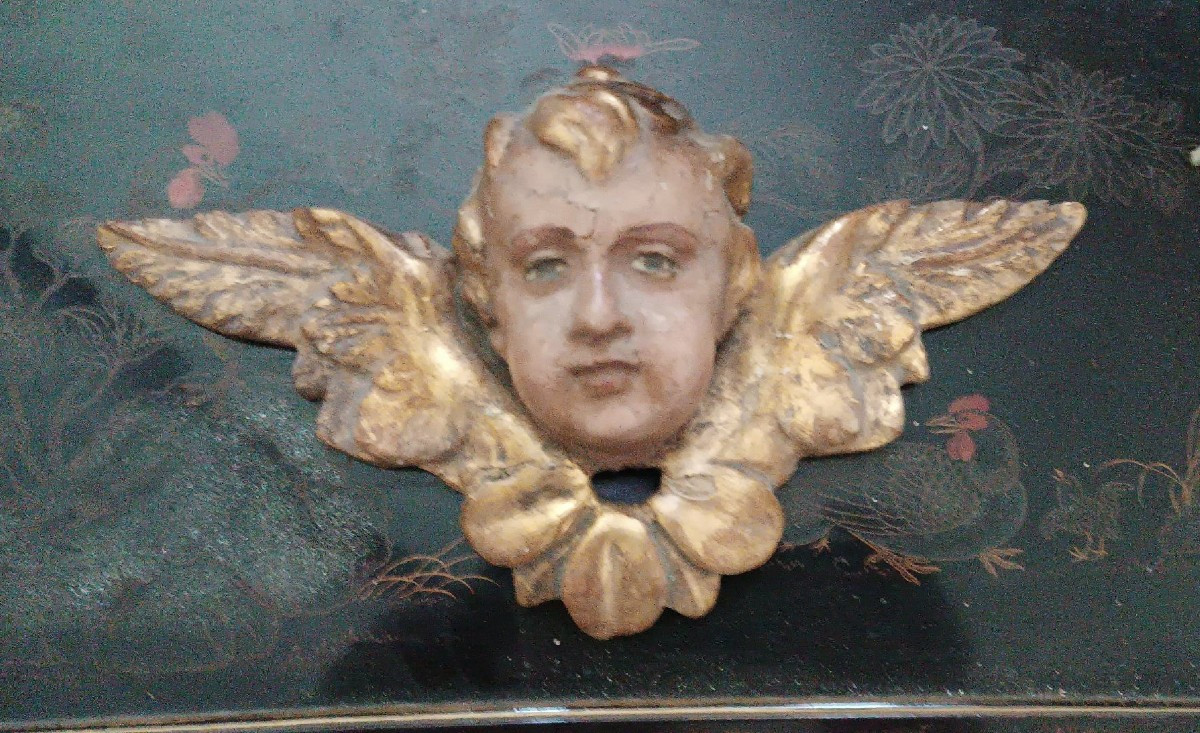 Antica scultura testa alata cherubino putto angelo