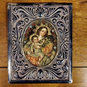 Antico dipinto su argento della Vergine col Bambino,