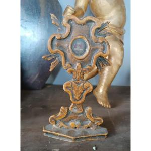 Piccolo reliquiario in legno laccato con reliquia XVIII secolo
