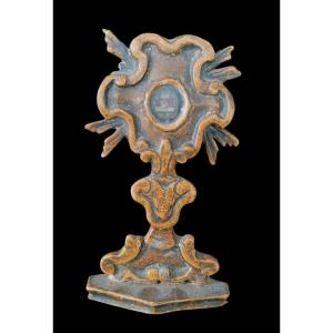 Piccolo reliquiario in legno laccato con reliquia XVIII secolo