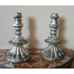Rara coppia antichi candelieri argentati in terracotta XVII secolo