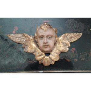 Antica scultura testa alata cherubino putto angelo