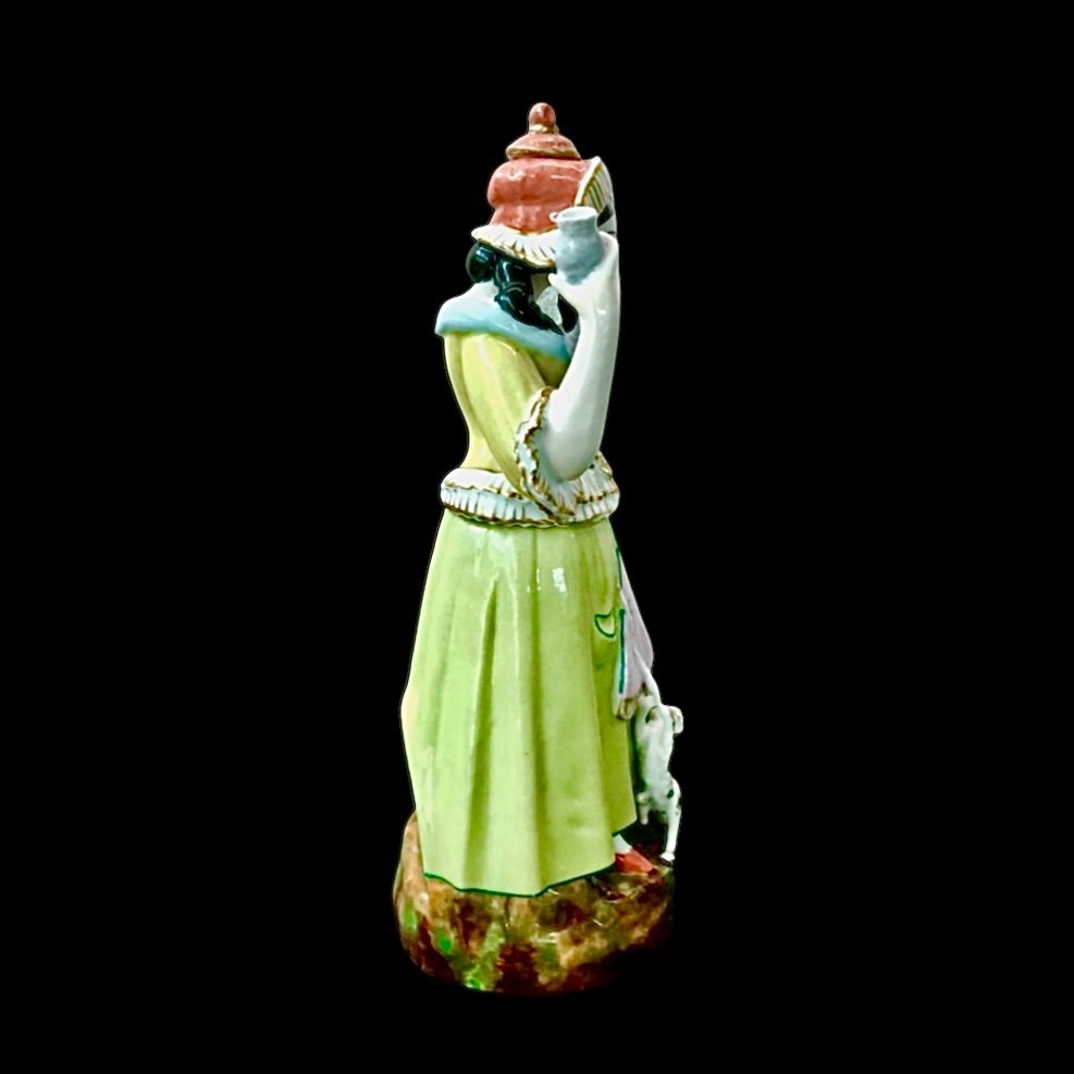 Veilleuse tisaniera in porcellana raffigurante figura femminile filandera.Francia.-photo-3