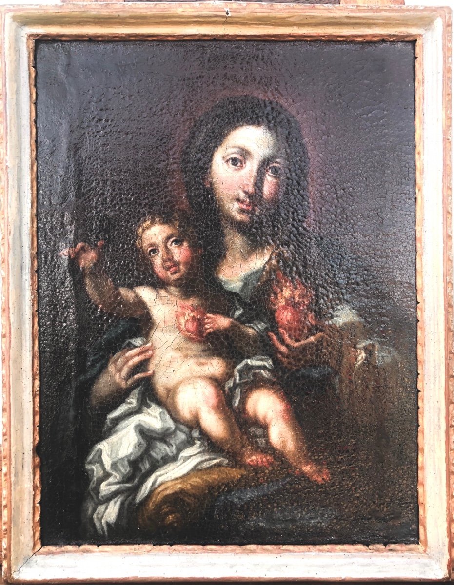 Dipinto olio su tela raffigurante Madonna con Gesu’Bambino.