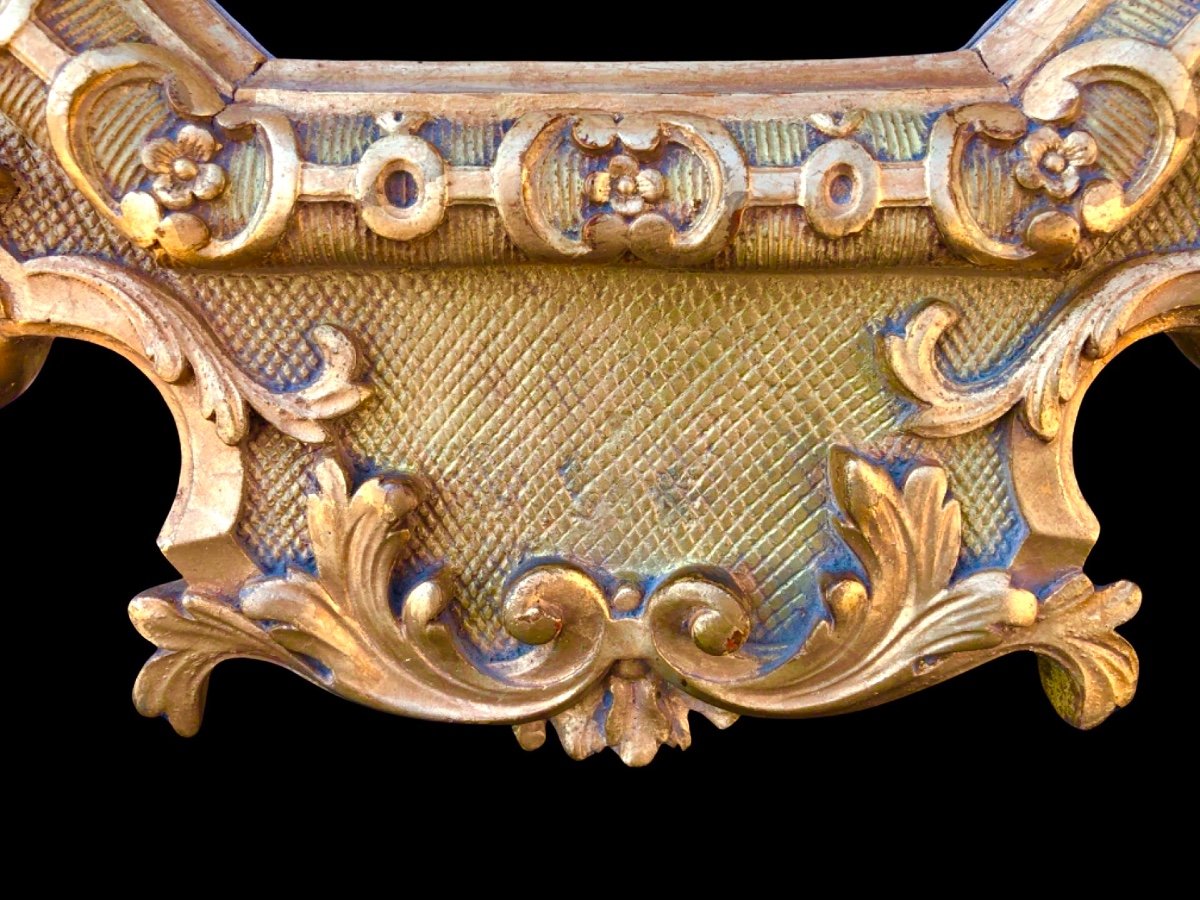 Cornice - specchiera in legno intagliato e dorato con motivi floreali e rocaille.-photo-4