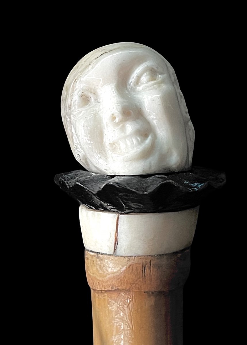 bastone con pomolo in avorio e ebano raffigurante testa di Pierrot con espressione  grottesca.-photo-2
