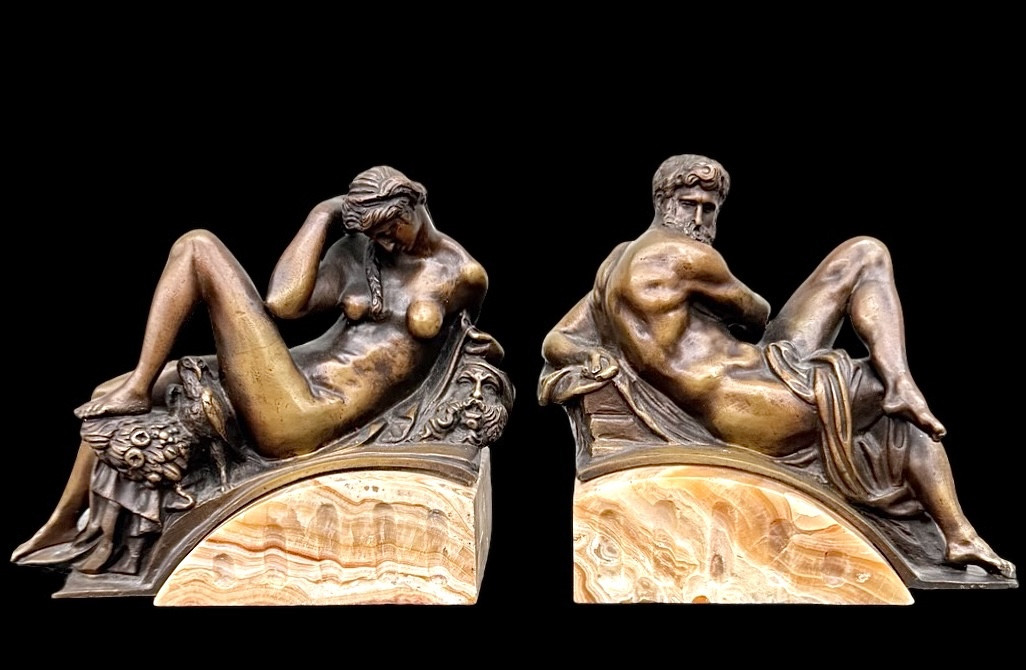 Coppia di fermalibri in bronzo,raffiguranti : Aurora e Crepuscolo  