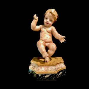 Scultura Gesu’Bambino in legno policromo.Italia. 