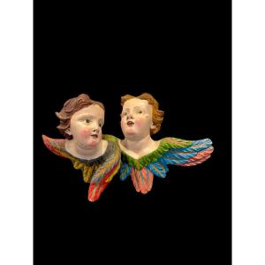 Coppia di Angeli-cherubini in legno intagliato e dipinto. Liguria.