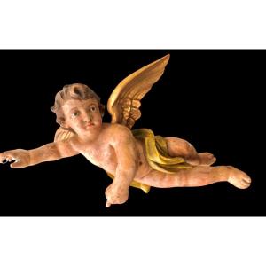 Scultura in legno intagliato policromo raffigurante un angelo ad ali spiegate.Liguria.
