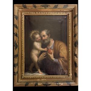Dipinto olio su tela raffigurante  San Giuseppe e Gesu’Bambino.Italia.