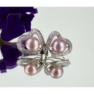 Pair Of Silver And Pearl Earrings