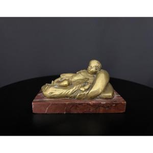 Charming Gilded Bronze Depicting A Child Asleep On A Cushion