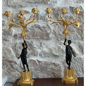 Pair Of Candelabras In Patinated Bronze And Gilded Bronze, Early 19th Century.
