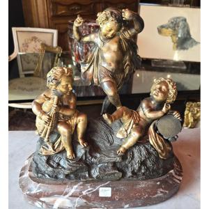 Group In Patinated And Gilded Bronze