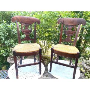 Pair Of Elegant Directoire Period Straw Chairs With Curule Backs Carved With A Soup Tureen.