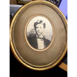 19th Century Oval Lithographic Portrait Of The Young Arthur Rimbaud, In Its Beaded Giltwood Frame