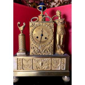 Charles X Mantel Clock, Gilt Chased Bronze With A Motif Of The Geographical Sciences & Reading