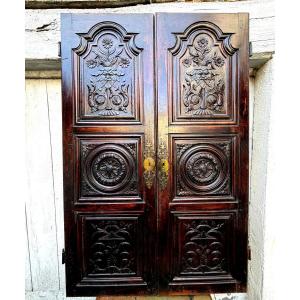 Rare Pair Of Richly Carved Walnut Cupboard Doors With Three Dark Patinated Louis XIV Panels