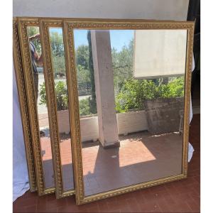 Quattro specchiere in legno dorato XIXsecolo