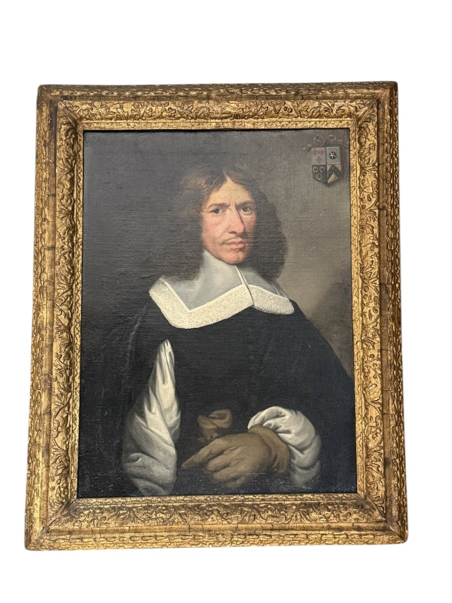 Ritratto di gentiluomo con stemma araldico