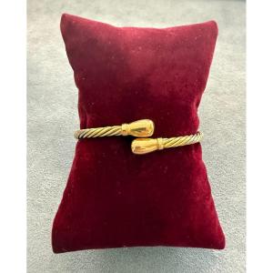 Bracciale rigido in oro 18 carati bicolore con finitura a corda ritorta
