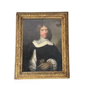 Ritratto di gentiluomo con stemma araldico