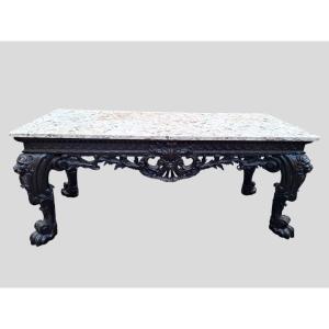 A Large, Highly Carved Console 
