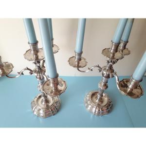 Coppia Candelabri in argento battuto a mano.