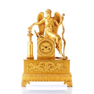 Empire Style Mantel Clock Decorated With A Cupid, Circa 1810-1830