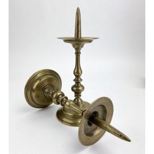 A Pair Of Copper Candlesticks