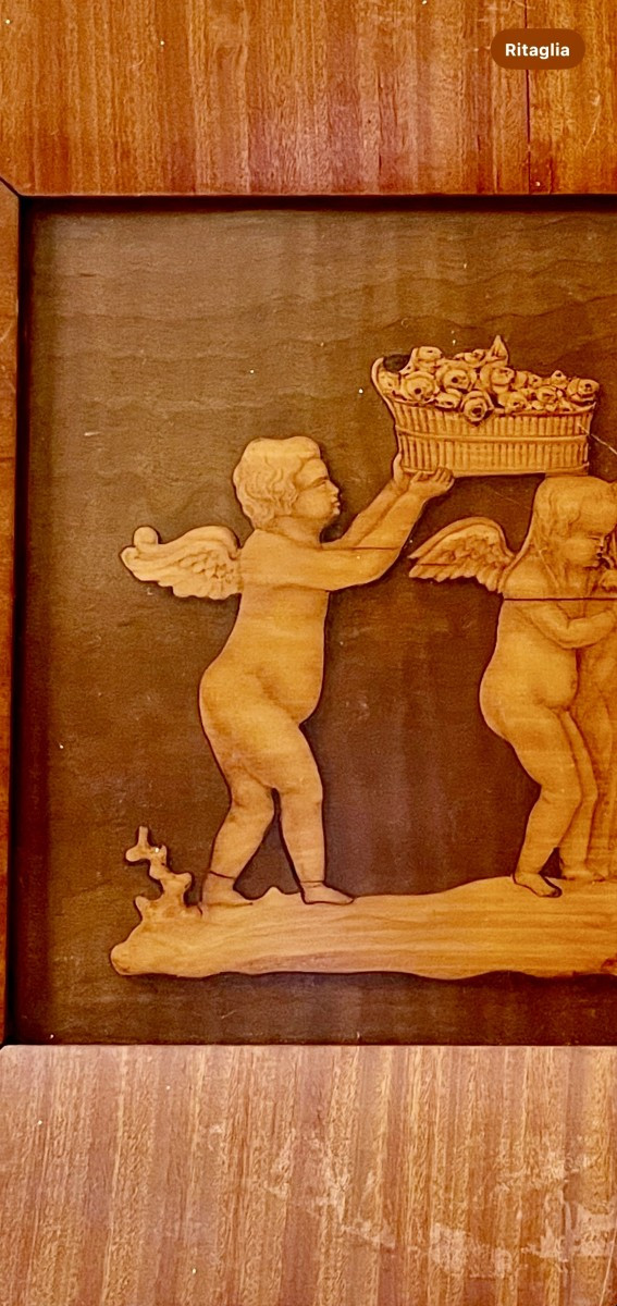 Tarsia lignea con figure di putti -photo-3