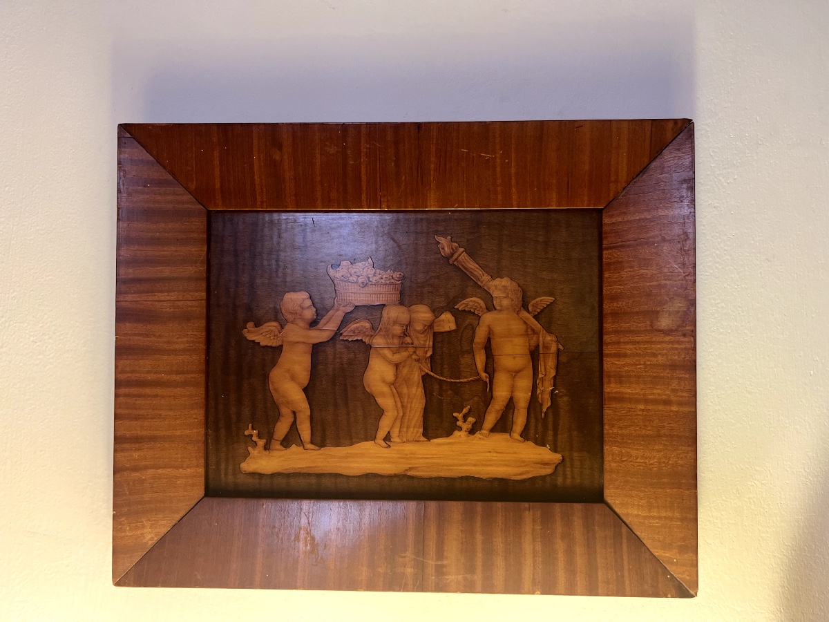 tarsia lignea con figure di putti 